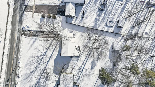 a view of a covered with snow in the background