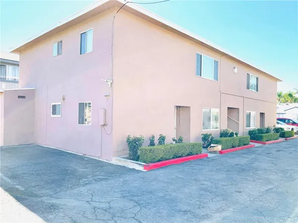 a front view of a house with garage