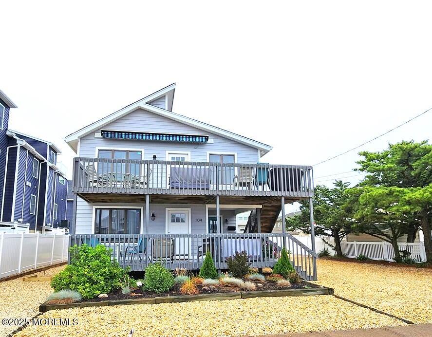 104 5th Avenue, Unit DOWN Seaside Heights, NJ 08751 - Photo 1 of 10 a front view of a house with swimming pool