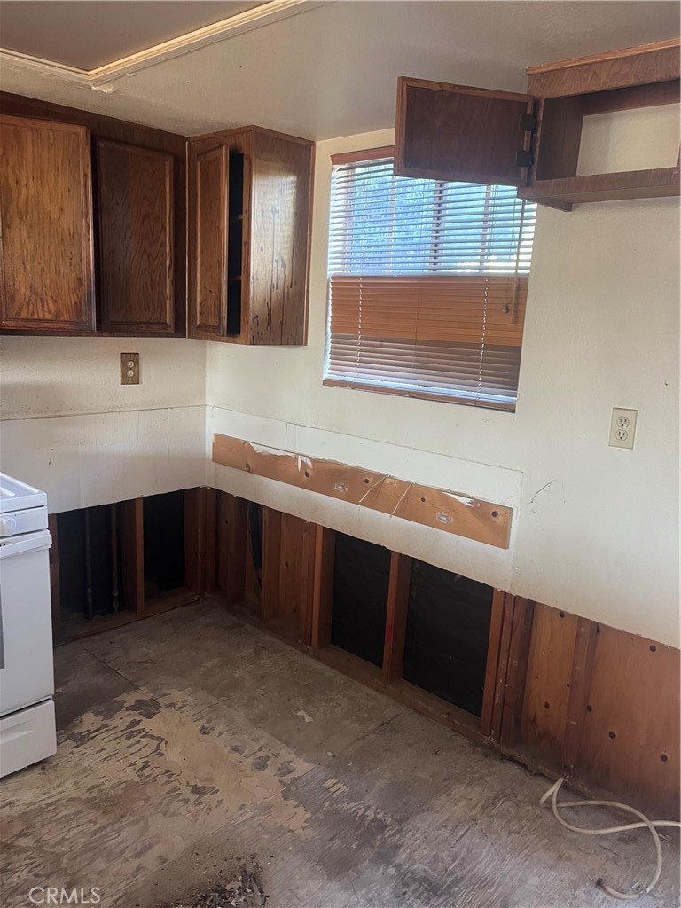 8812 Spring Canyon Drive Spring Valley, CA 91977 - Photo 12 of 22 a kitchen with a sink and a cabinets