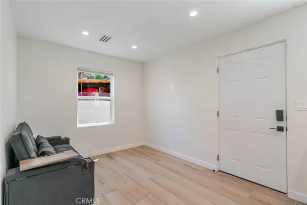a room with furniture and a window