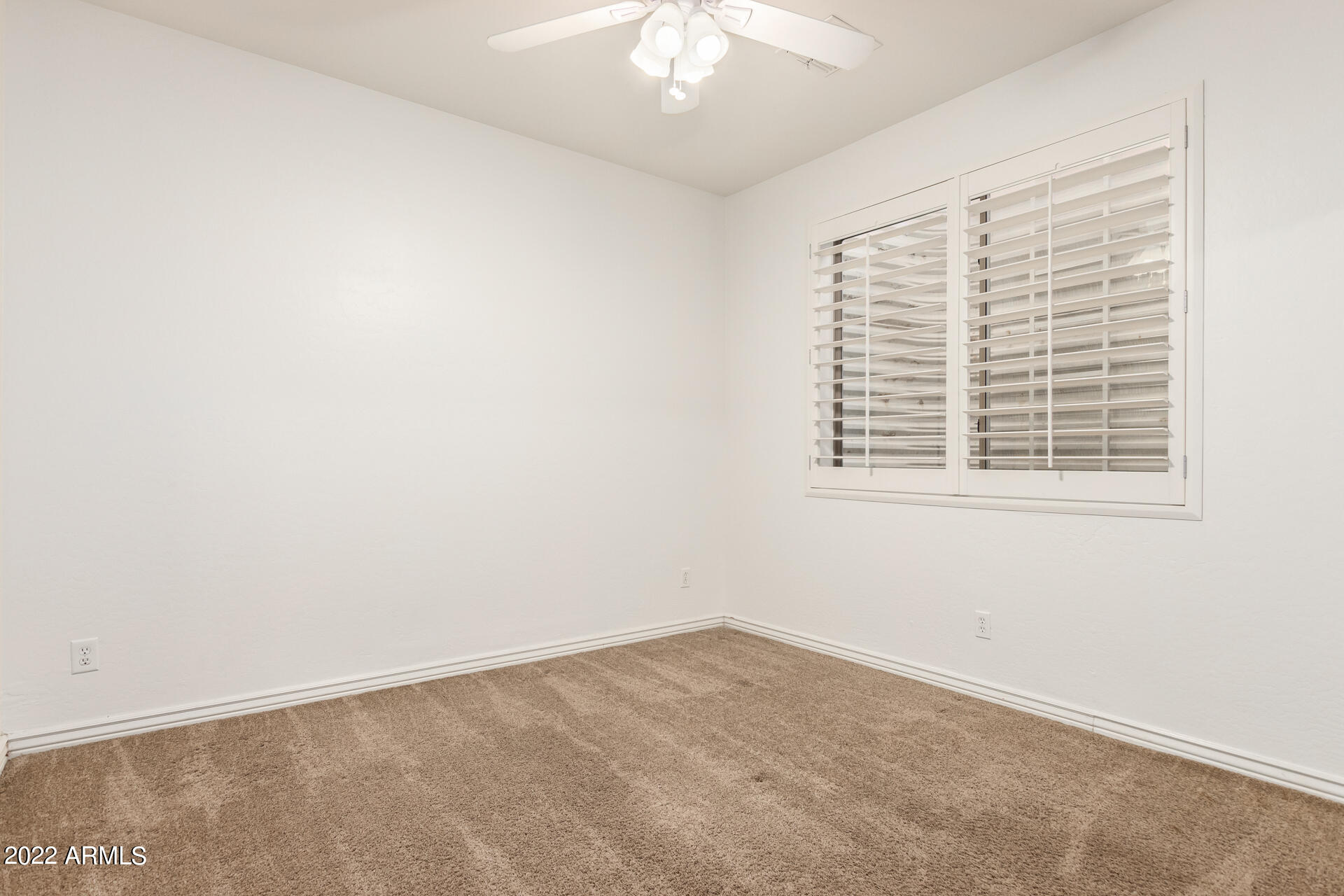 4584 East Reins Road Gilbert, AZ 85297 - Photo 23 of 80 an empty room with a window