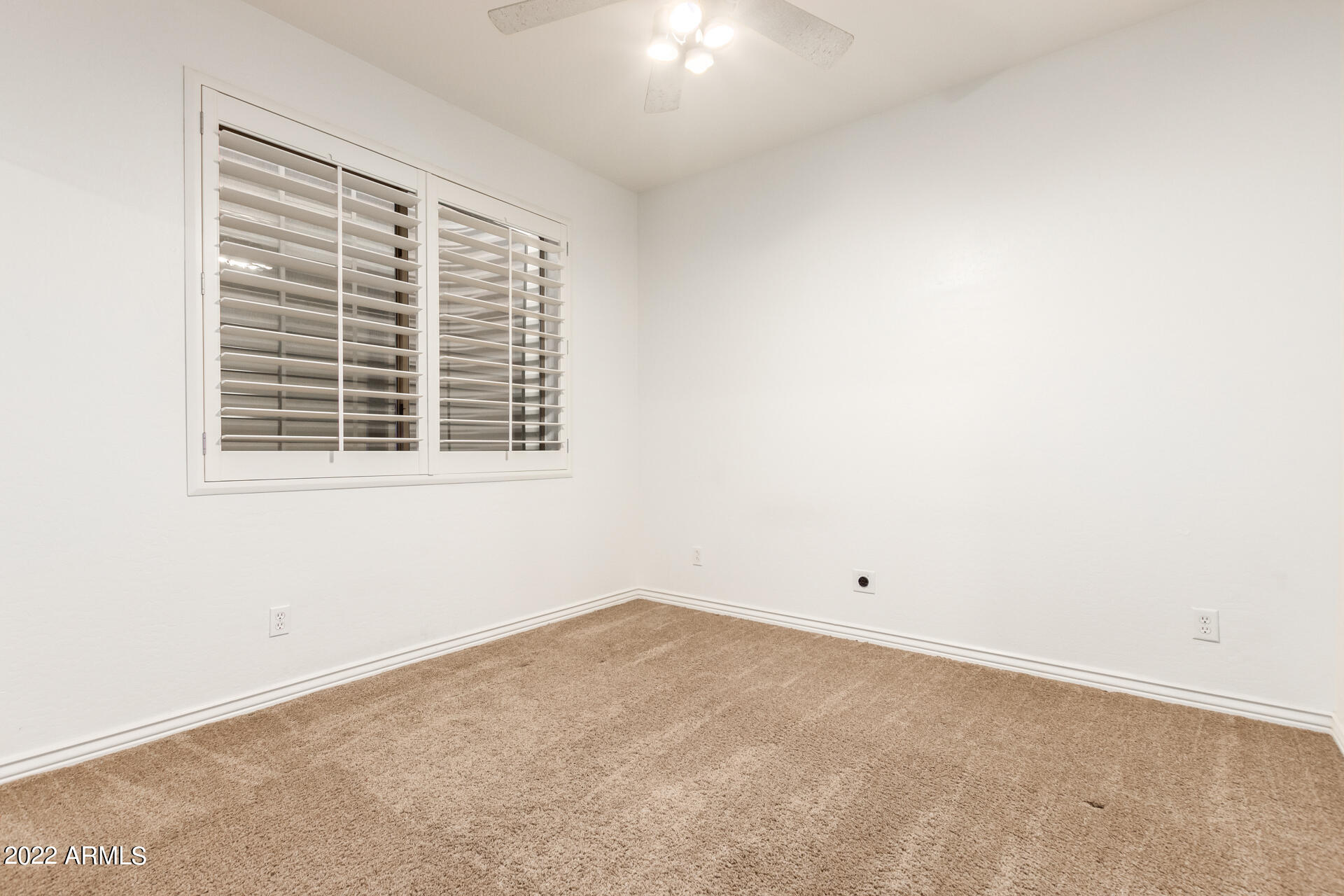 4584 East Reins Road Gilbert, AZ 85297 - Photo 27 of 80 an empty room with a window