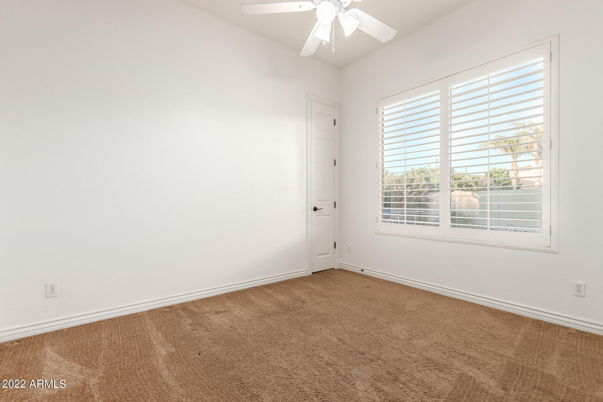 4584 East Reins Road Gilbert, AZ 85297 - Photo 29 of 80 an empty room with a window