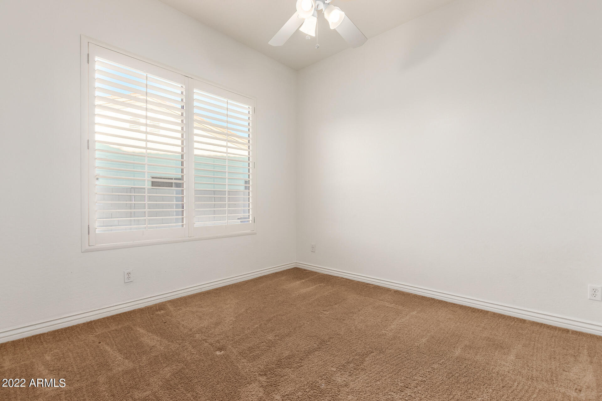 4584 East Reins Road Gilbert, AZ 85297 - Photo 31 of 80 an empty room with a window