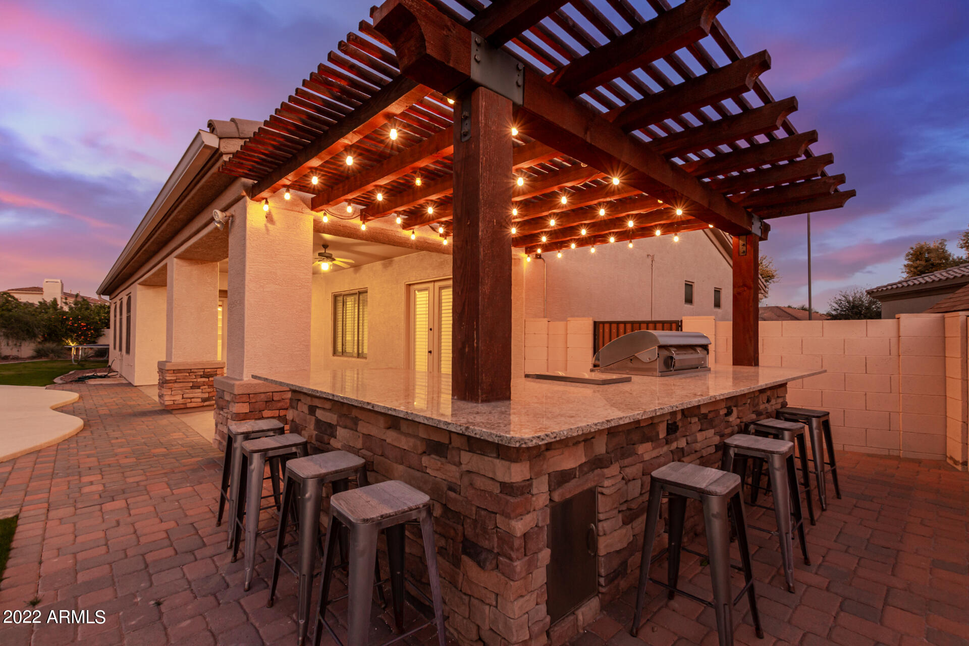 4584 East Reins Road Gilbert, AZ 85297 - Photo 42 of 80 a view of a chairs and table in the patio