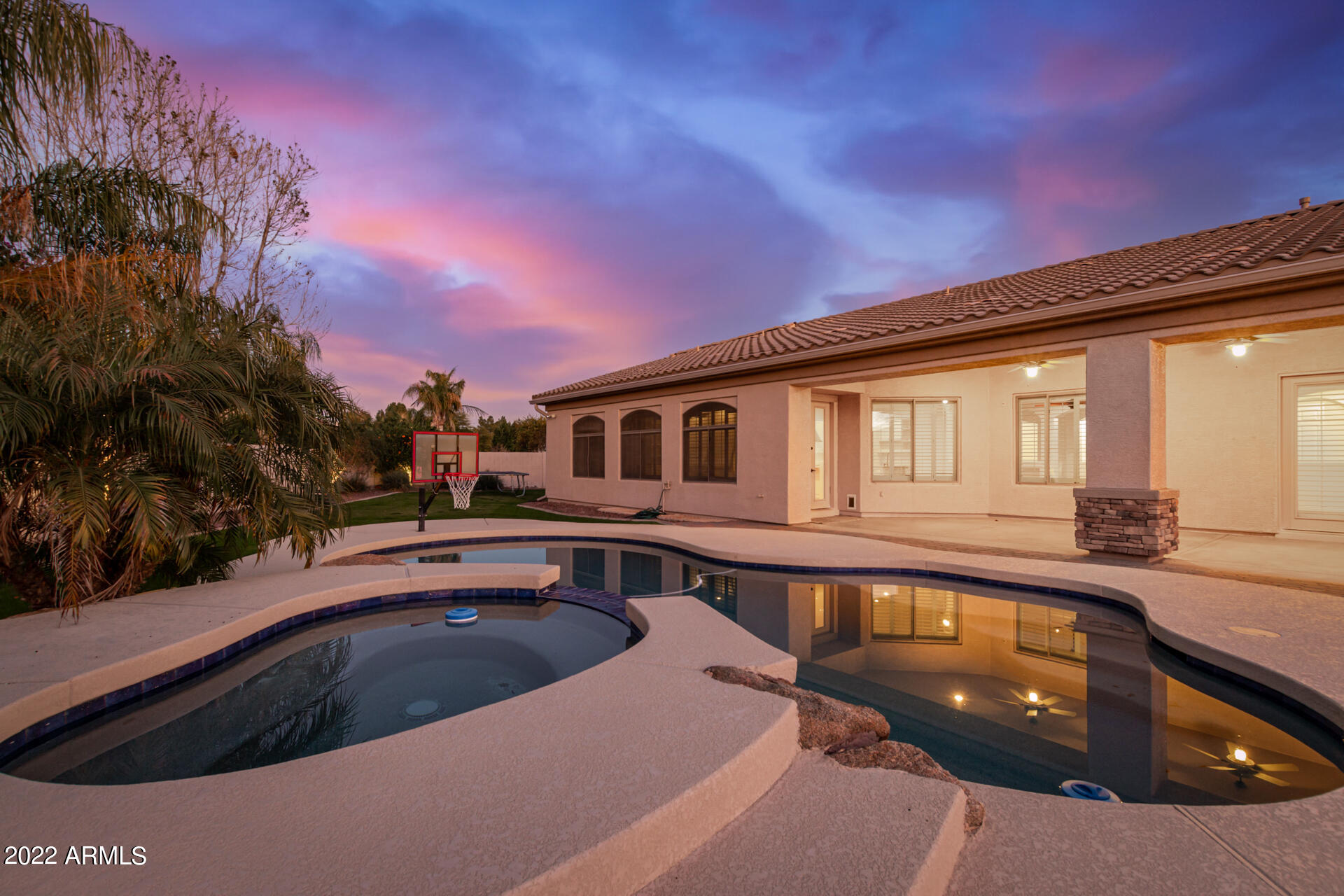 4584 East Reins Road Gilbert, AZ 85297 - Photo 45 of 80 a view of a house with swimming pool and sitting area
