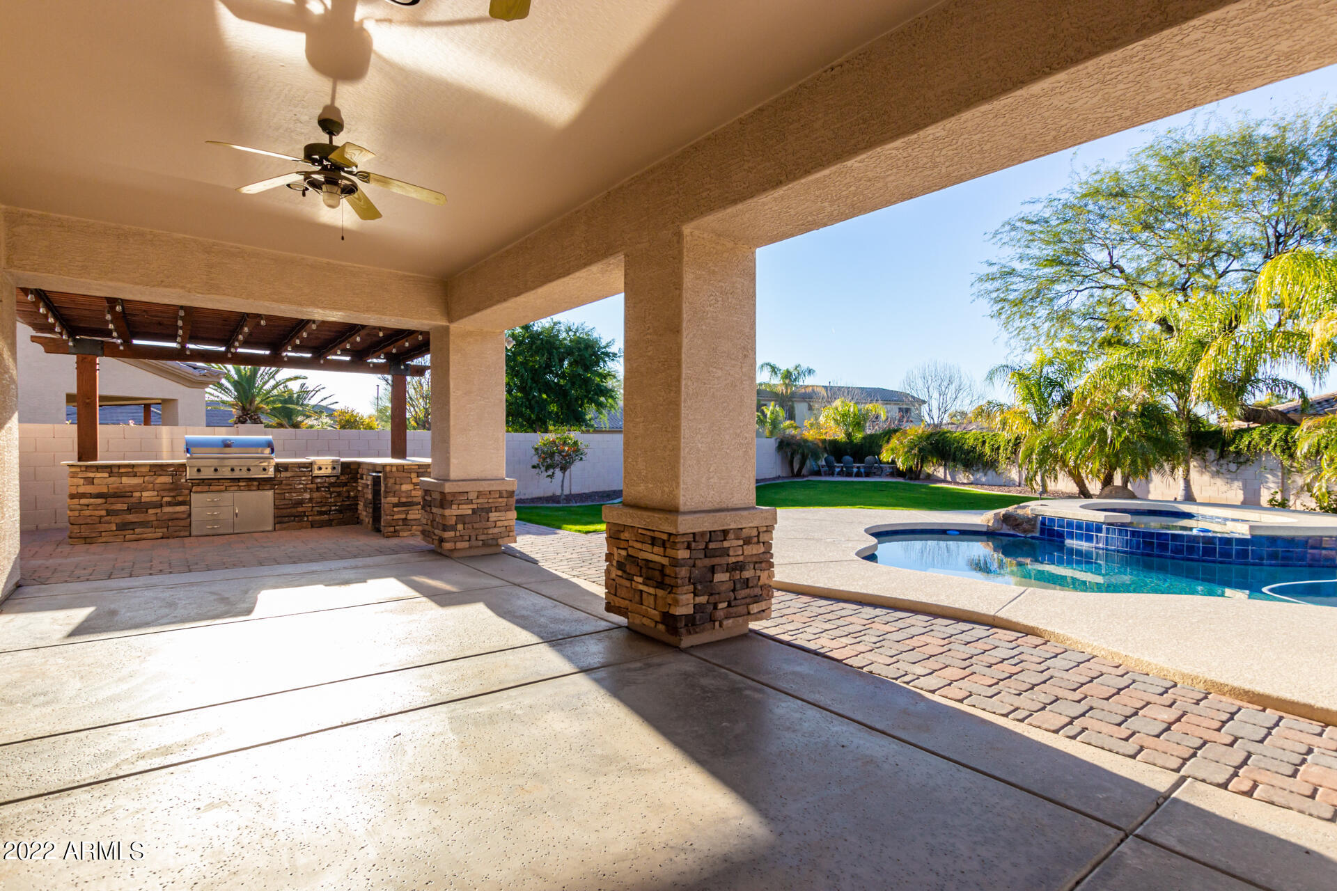 4584 East Reins Road Gilbert, AZ 85297 - Photo 48 of 80 a view of a two chairs and table in the patio
