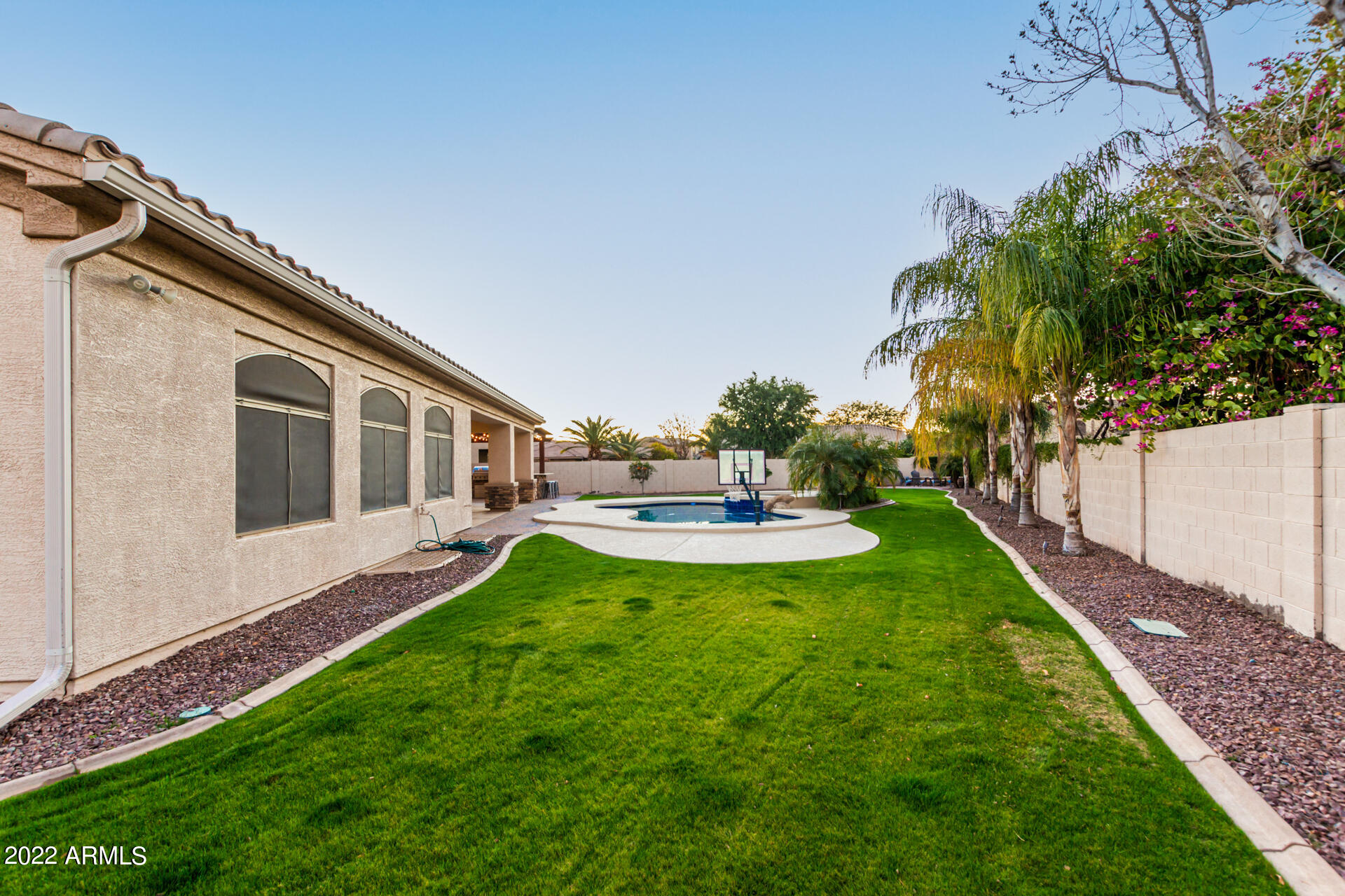 4584 East Reins Road Gilbert, AZ 85297 - Photo 55 of 80 a house view with a garden space
