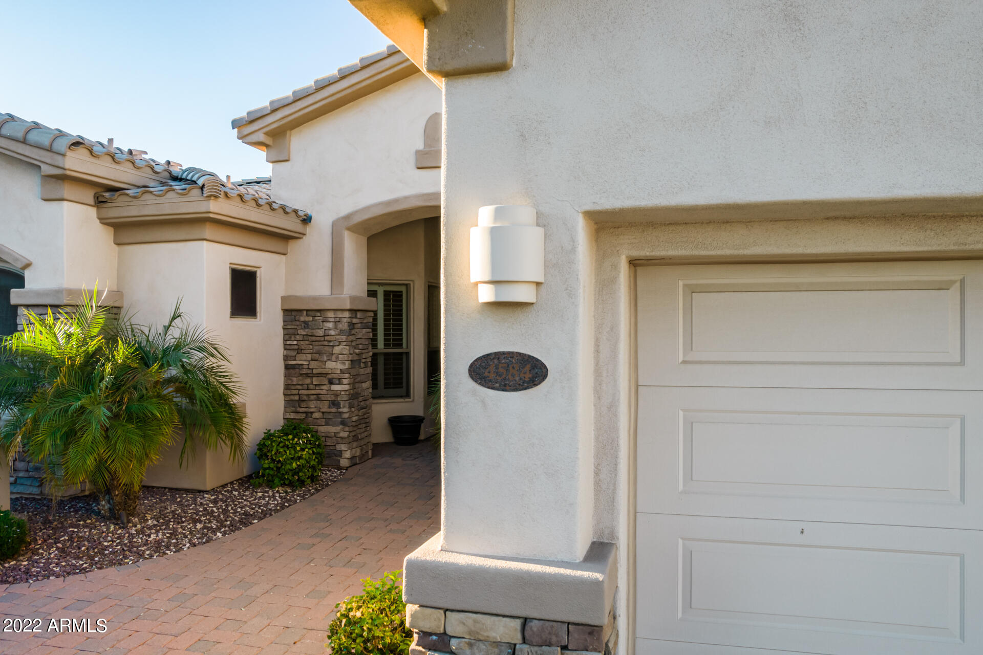 4584 East Reins Road Gilbert, AZ 85297 - Photo 57 of 80 a front view of a house with yard