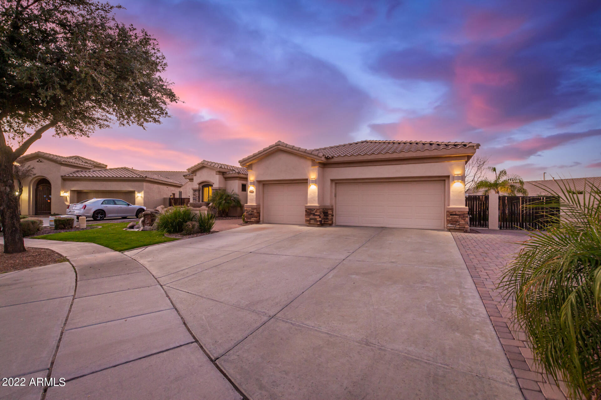 4584 East Reins Road Gilbert, AZ 85297 - Photo 59 of 80 a front view of a house with a yard and garage