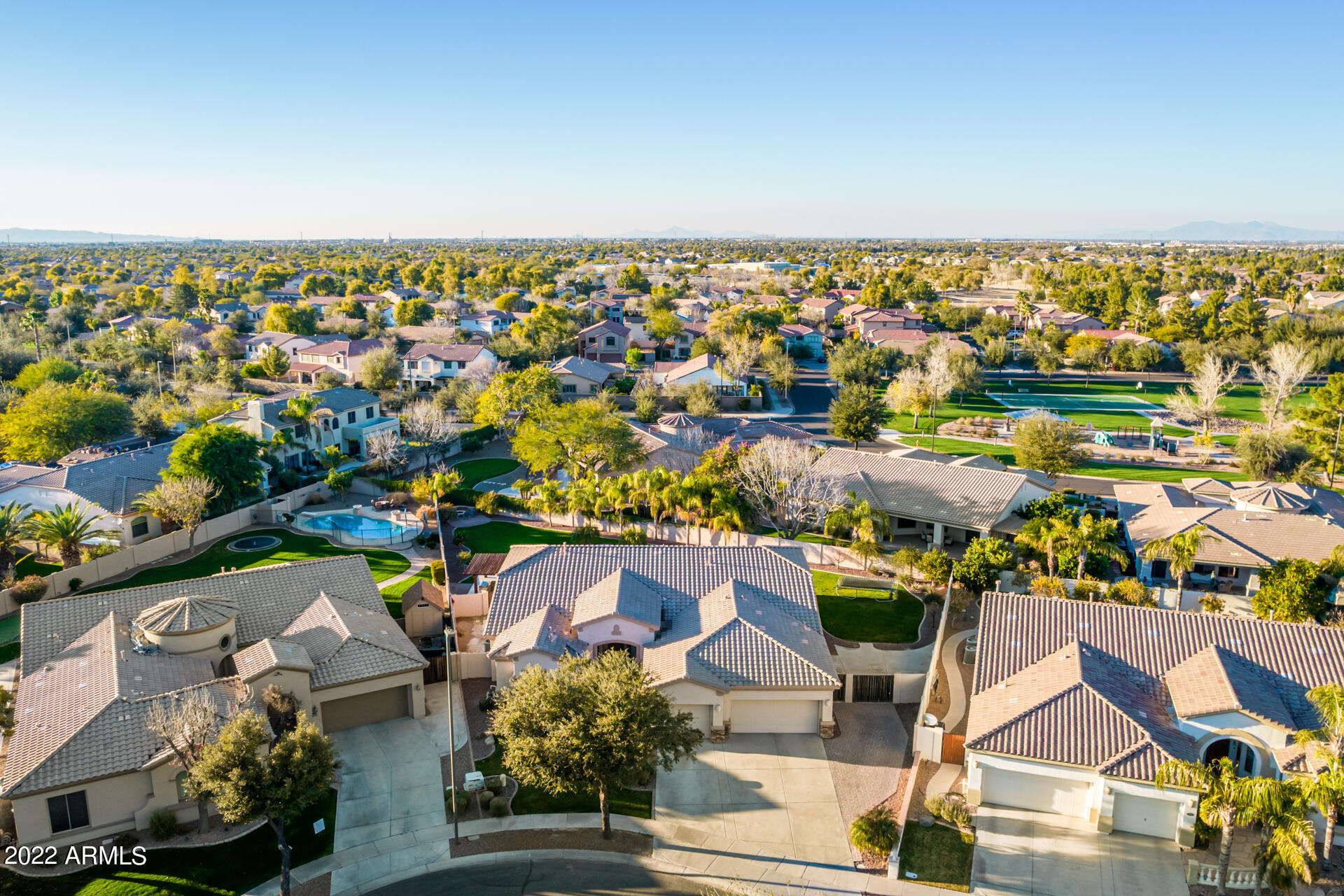 4584 East Reins Road Gilbert, AZ 85297 - Photo 66 of 80 an aerial view of residential houses with outdoor space