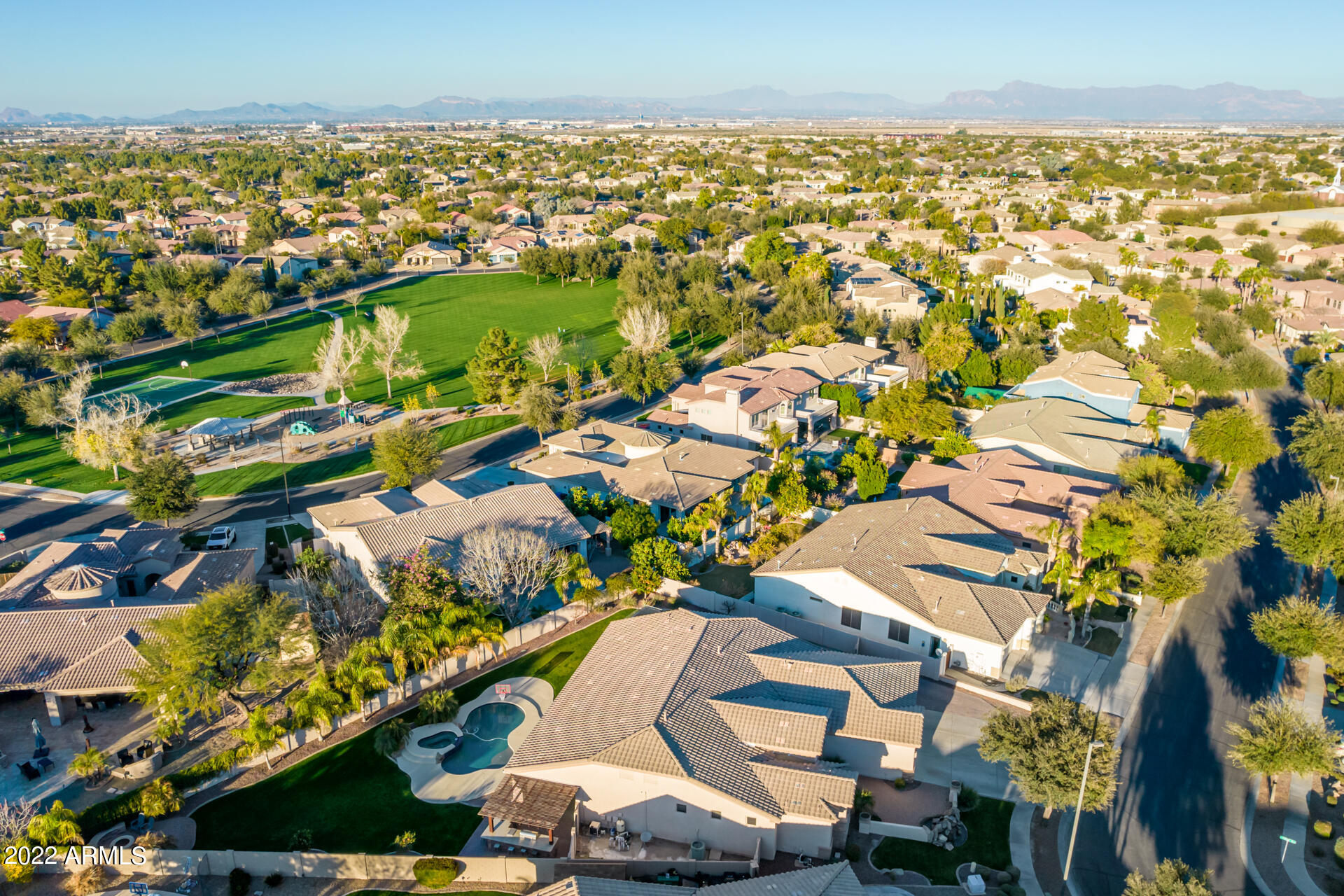 4584 East Reins Road Gilbert, AZ 85297 - Photo 76 of 80 an aerial view of residential houses with outdoor space