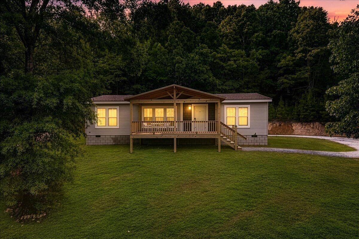 1629 Wasson Road Ten Mile, TN 37880 - Photo 1 of 27 a view of a house with a swimming pool