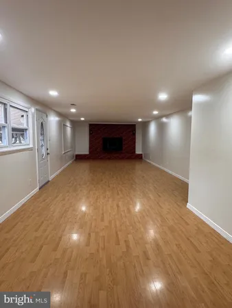 a view of a big room with wooden floor