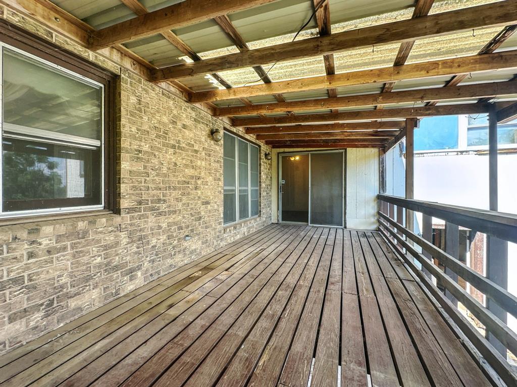 601 East Henry Street Hamilton, TX 76531 - Photo 15 of 40 a view of outdoor space with wooden floor