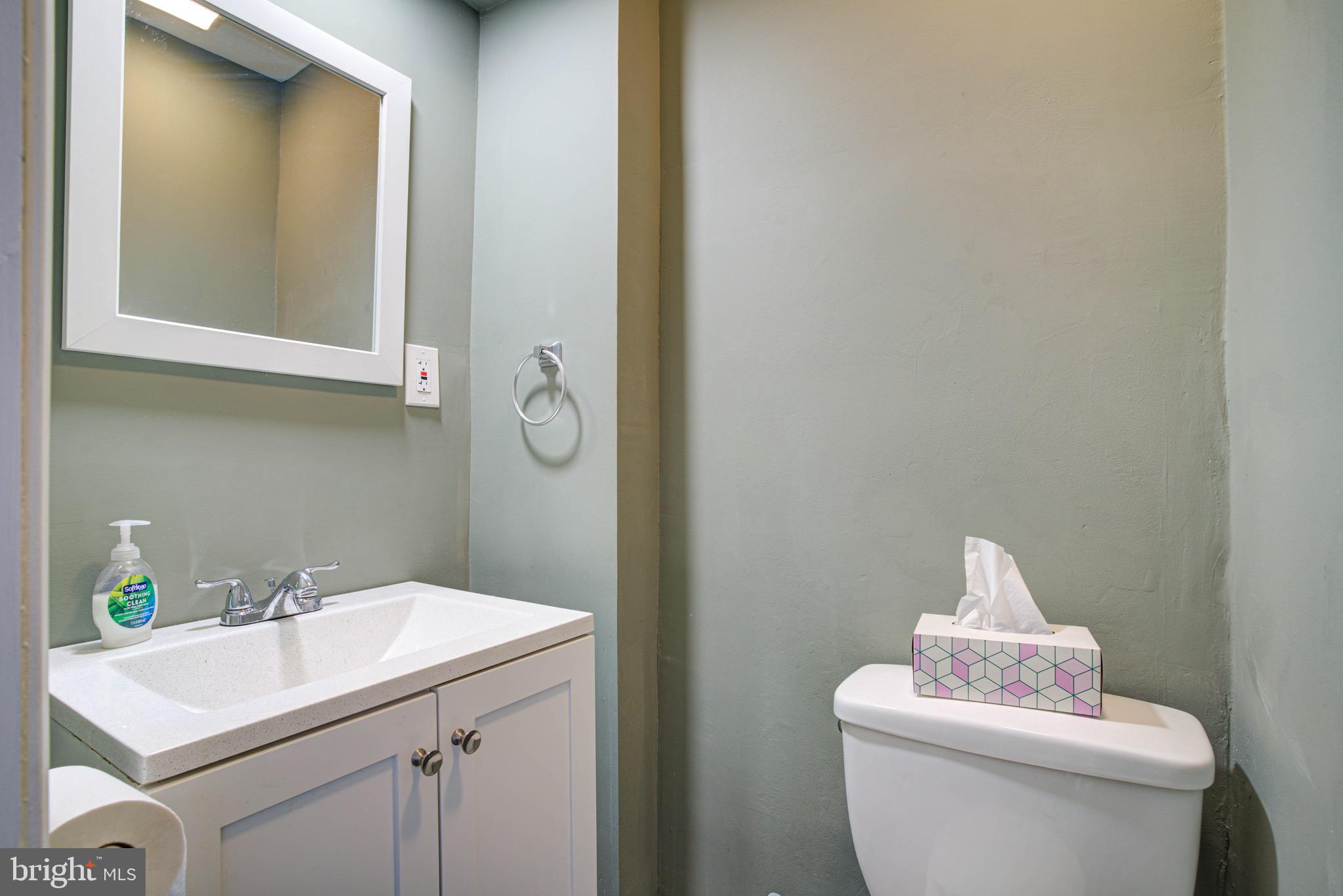 2331 East Hazzard Street Philadelphia, PA 19125 - Photo 19 of 24 a bathroom with a sink and a toilet