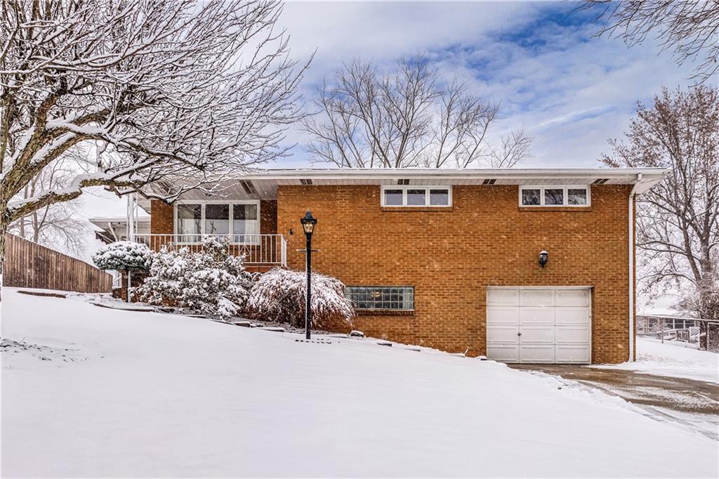 Welcome home to this charming brick ranch located in the heart of Moon Township. 
