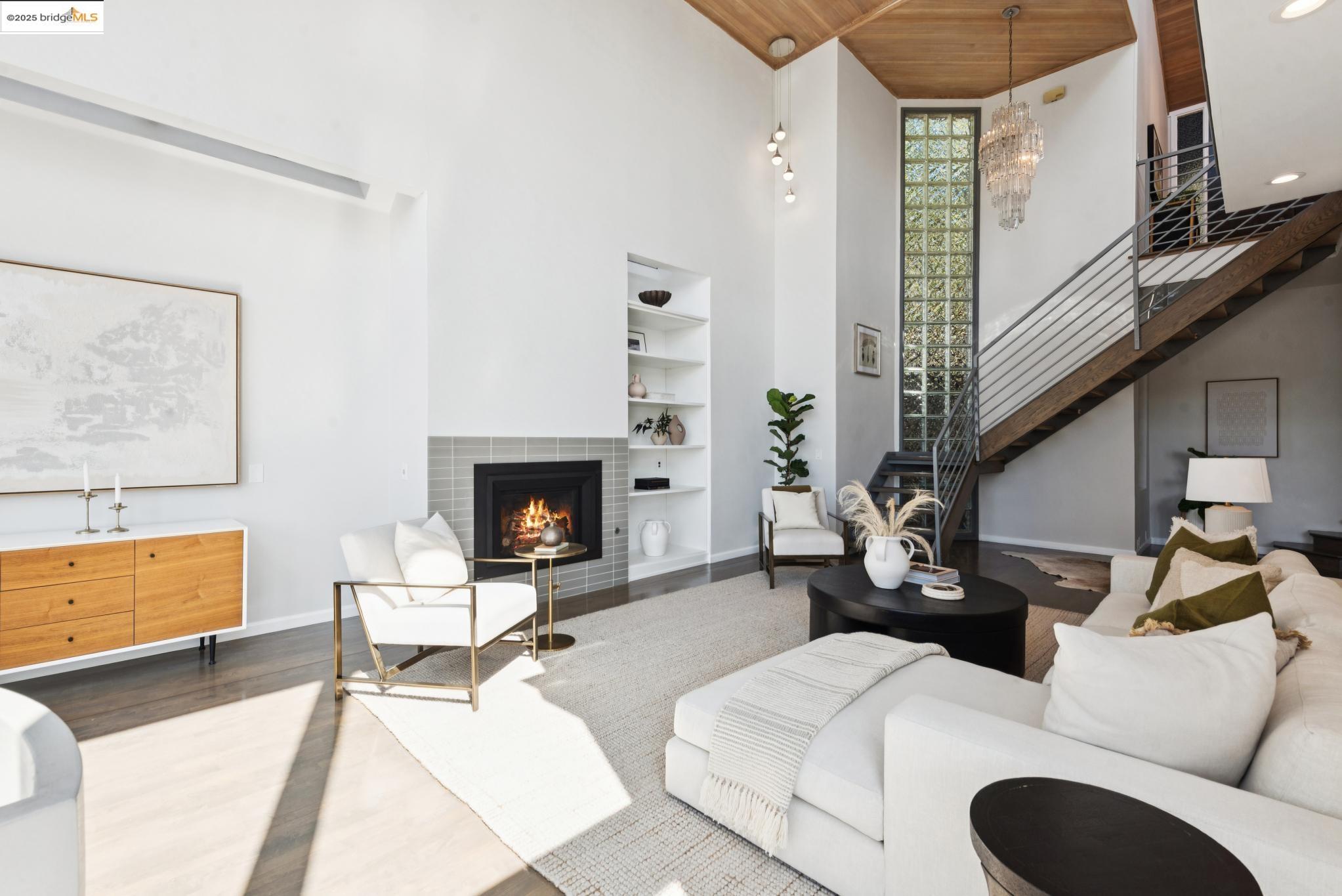 2861 Chelsea Drive Oakland, CA 94611 - Photo 15 of 56 a living room with furniture and a fireplace