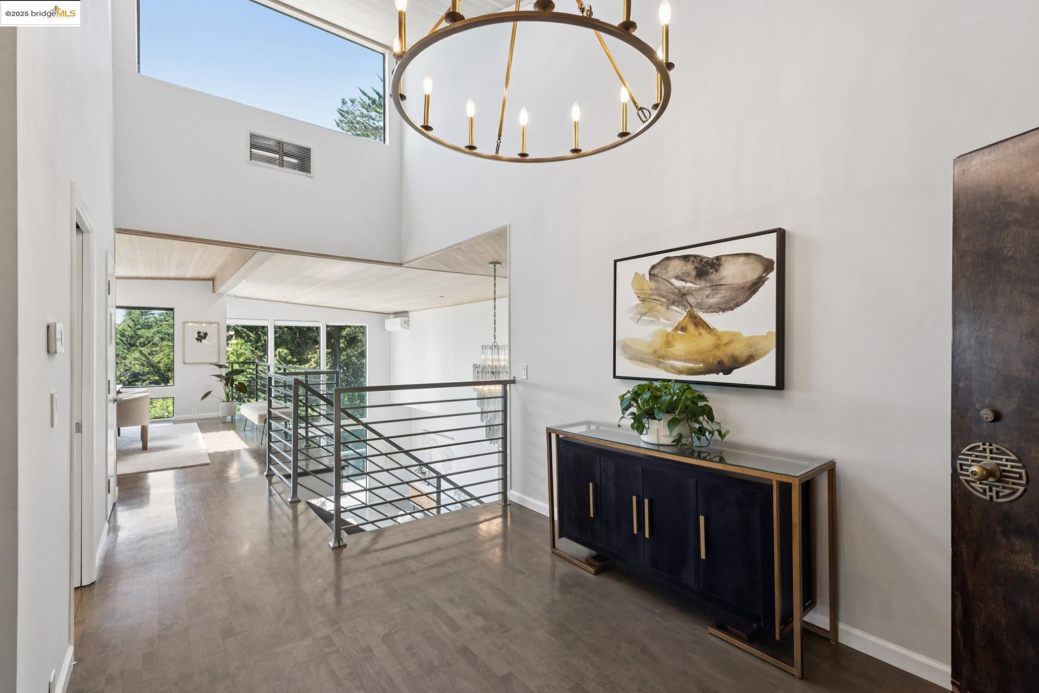 2861 Chelsea Drive Oakland, CA 94611 - Photo 2 of 56 a living room with furniture and a flat screen tv