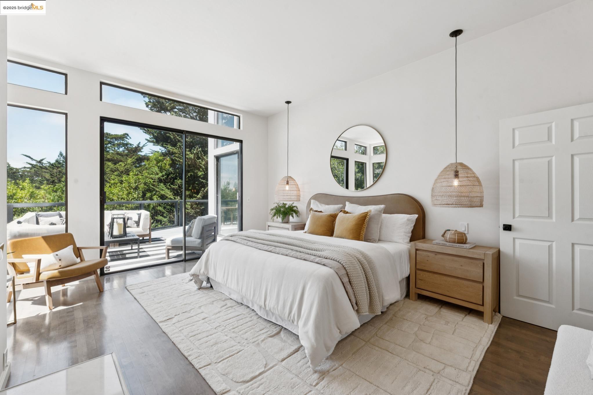 2861 Chelsea Drive Oakland, CA 94611 - Photo 28 of 56 a bedroom with bed and a large window