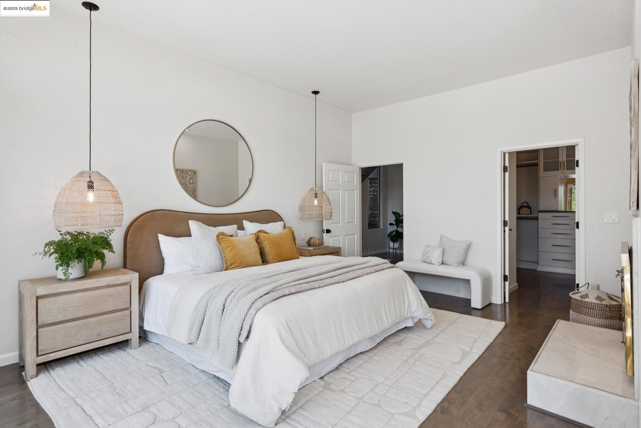 2861 Chelsea Drive Oakland, CA 94611 - Photo 30 of 56 a bedroom with bed and a chandelier