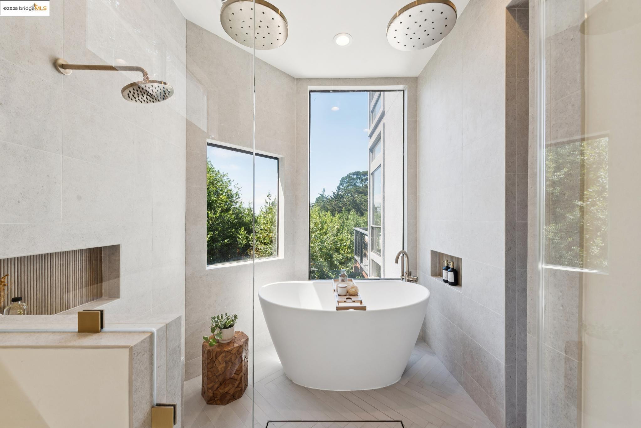 2861 Chelsea Drive Oakland, CA 94611 - Photo 36 of 56 a white bath tub sitting in a bathroom next to a window