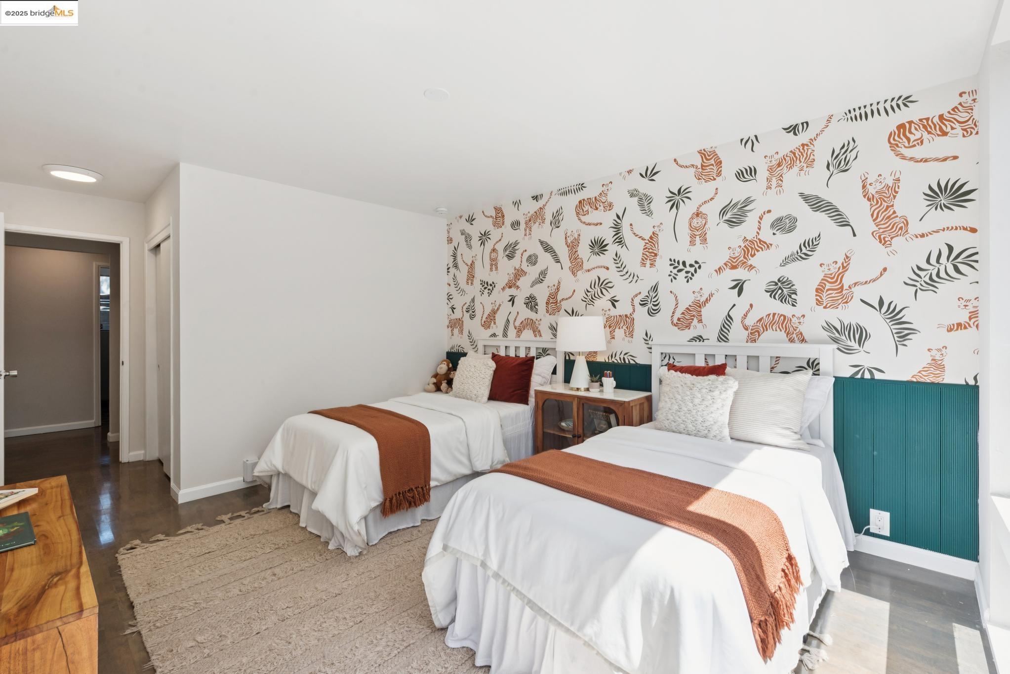 2861 Chelsea Drive Oakland, CA 94611 - Photo 40 of 56 a bedroom with two beds and painted walls