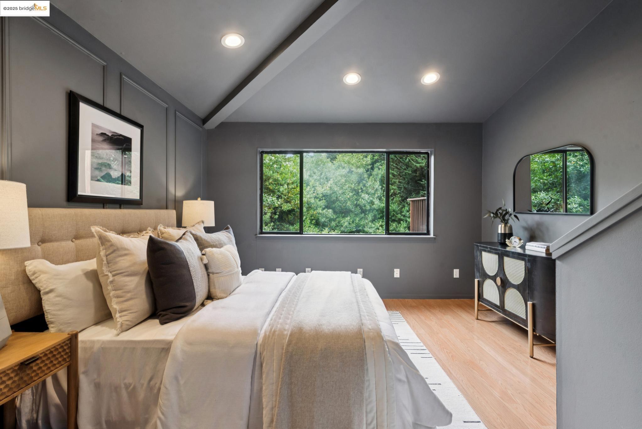 2861 Chelsea Drive Oakland, CA 94611 - Photo 47 of 56 a bedroom with a large bed and a window