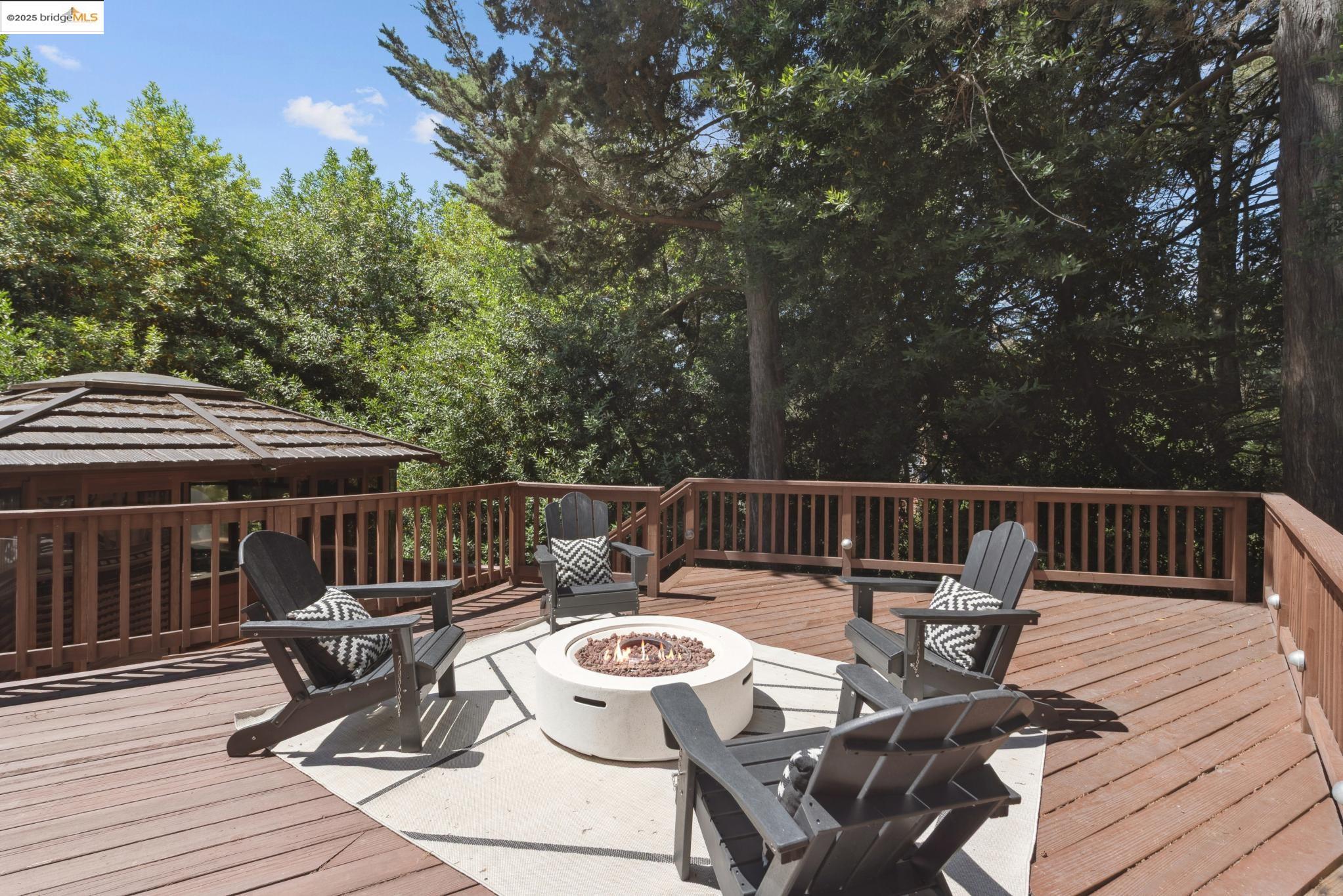 2861 Chelsea Drive Oakland, CA 94611 - Photo 52 of 56 a view of balcony with wooden floor outdoor seating and yard in the back