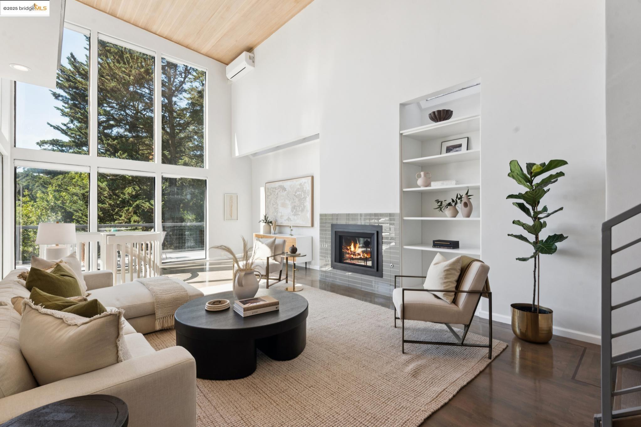 2861 Chelsea Drive Oakland, CA 94611 - Photo 9 of 56 a living room with furniture and a fireplace