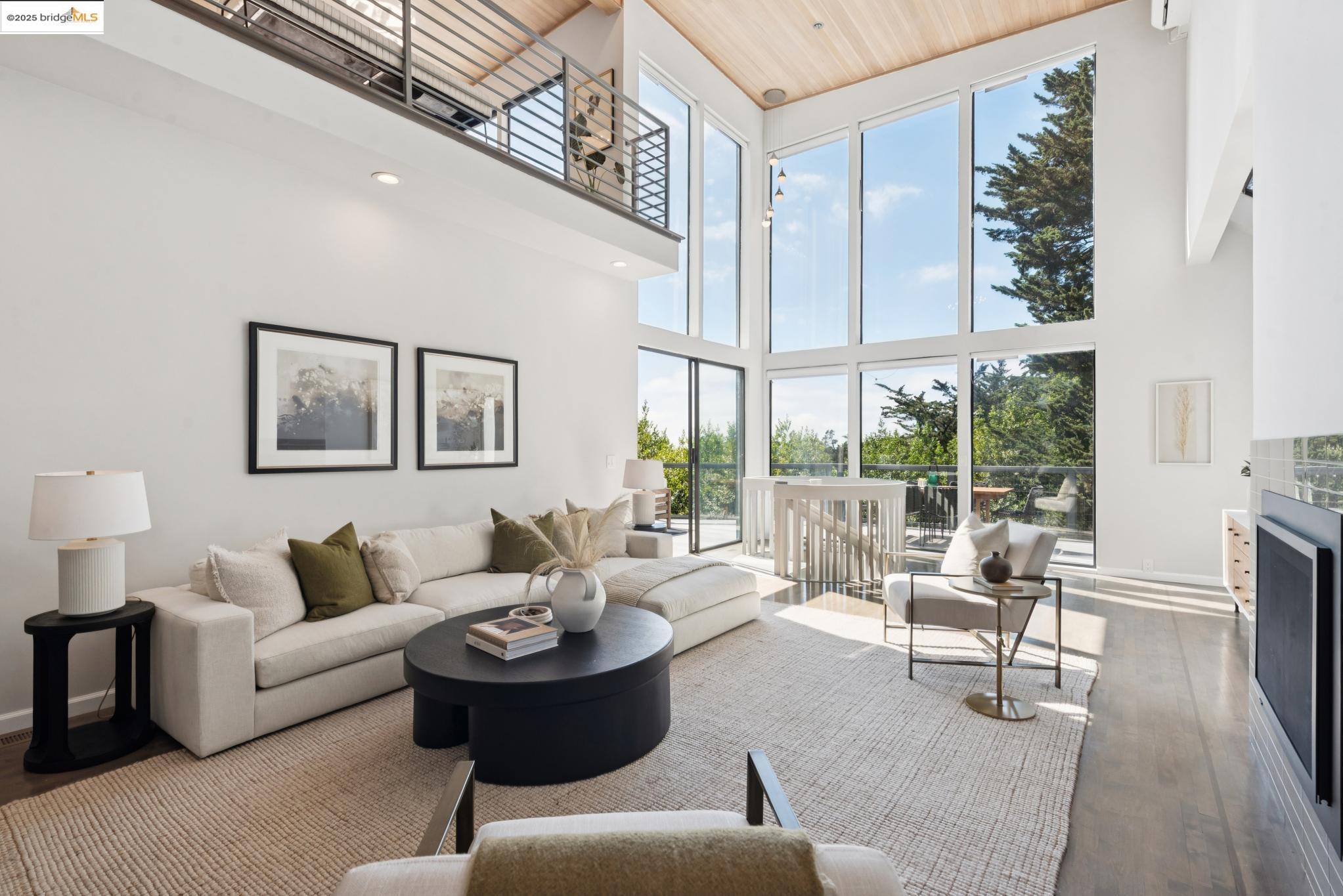 2861 Chelsea Drive Oakland, CA 94611 - Photo 10 of 56 a living room with furniture and a large window