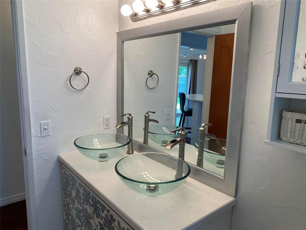 718 Northeast 5th Avenue Pompano Beach, FL 33060 - Photo 17 of 32 a bathroom with a sink and a mirror
