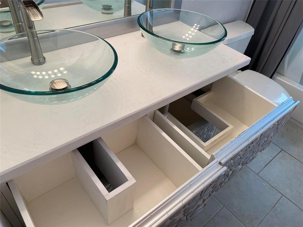 718 Northeast 5th Avenue Pompano Beach, FL 33060 - Photo 19 of 32 a kitchen with a stove and a sink