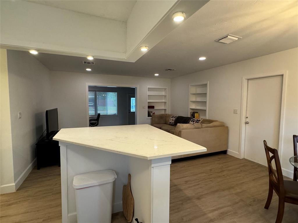 718 Northeast 5th Avenue Pompano Beach, FL 33060 - Photo 10 of 32 a large kitchen with sink a refrigerator and a refrigerator