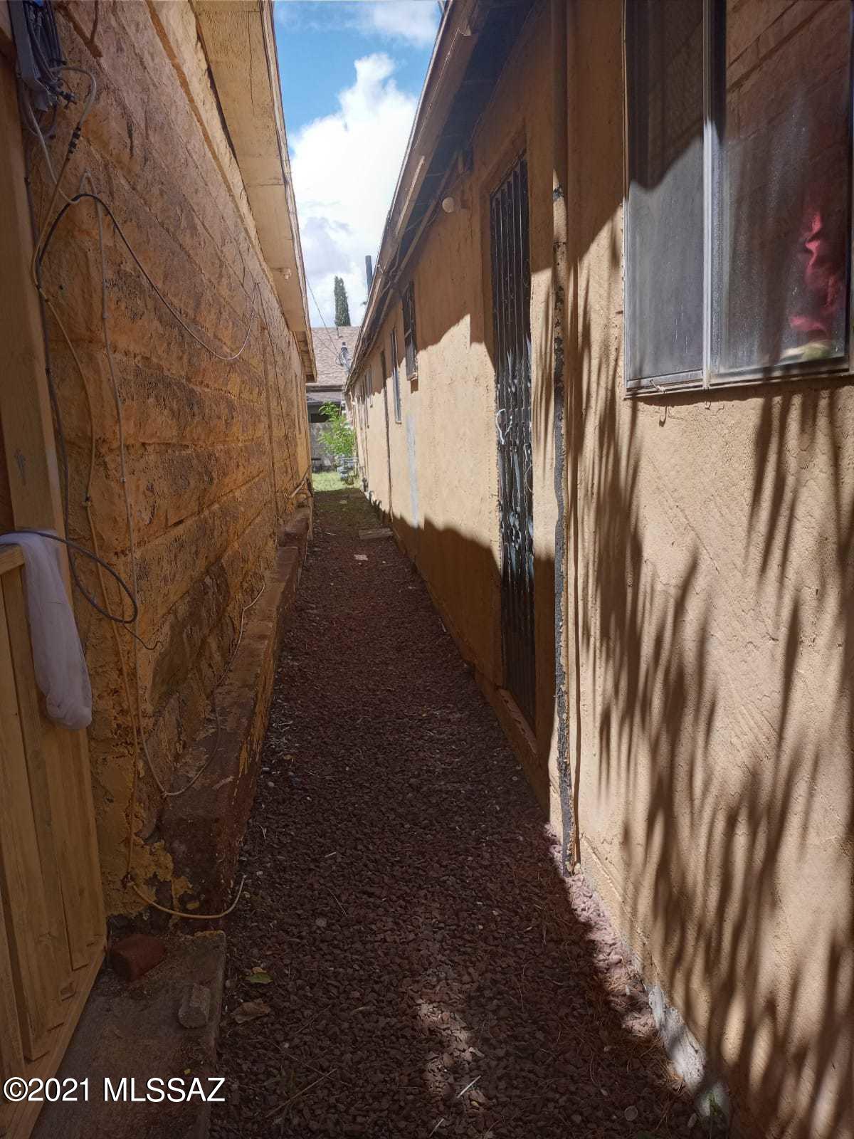 Undisclosed Address Douglas, AZ 85607 - Photo 6 of 16 a view of a back yard of a building