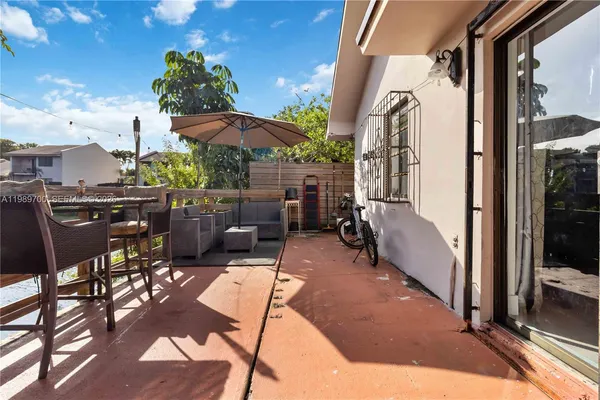 an aerial view of city and lake