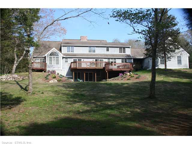 273 Cemetery Road Canterbury, CT 06331 - Photo 1 of 1 a front view of a house with a garden