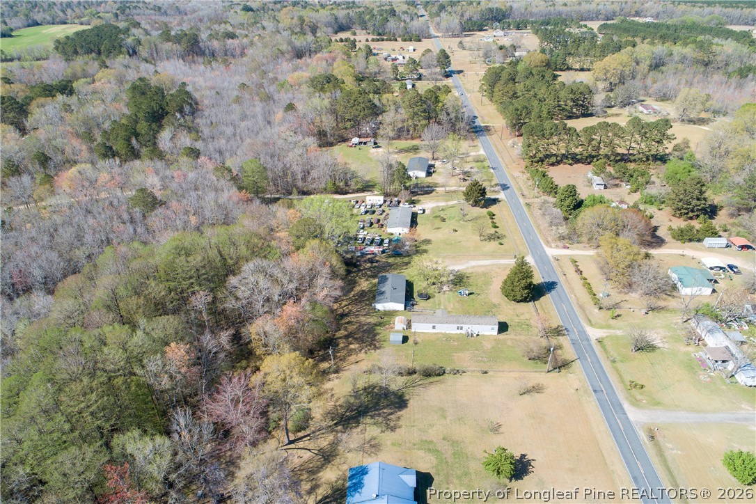 8637 Durant Nixon Road Linden, NC 28356 - Photo 35 of 36 an aerial view of residential houses with outdoor space