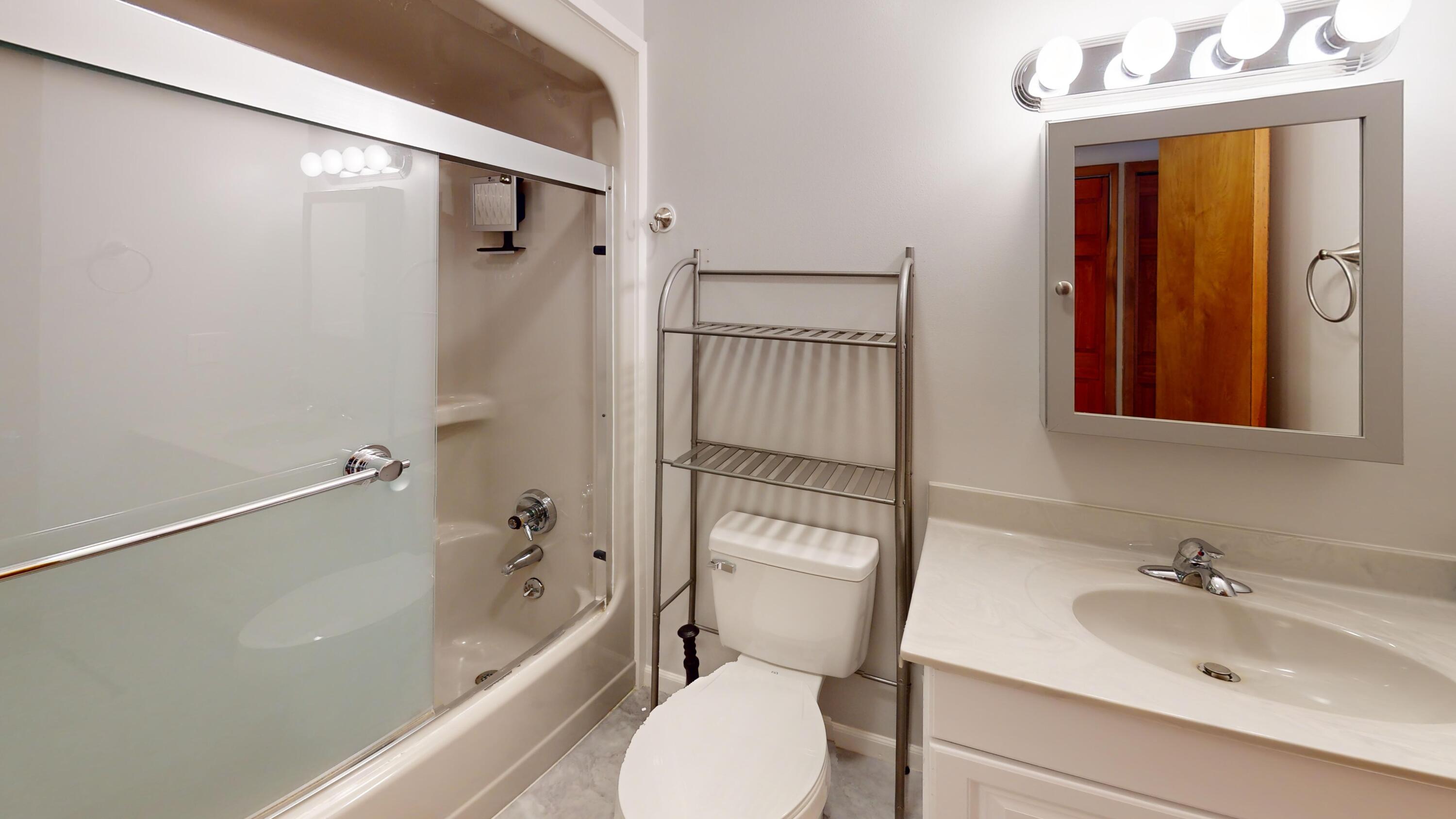 2424 Hallock Road Gaylord, MI 49735 - Photo 22 of 43 2424-Hallock-Rd-Bathroom 1