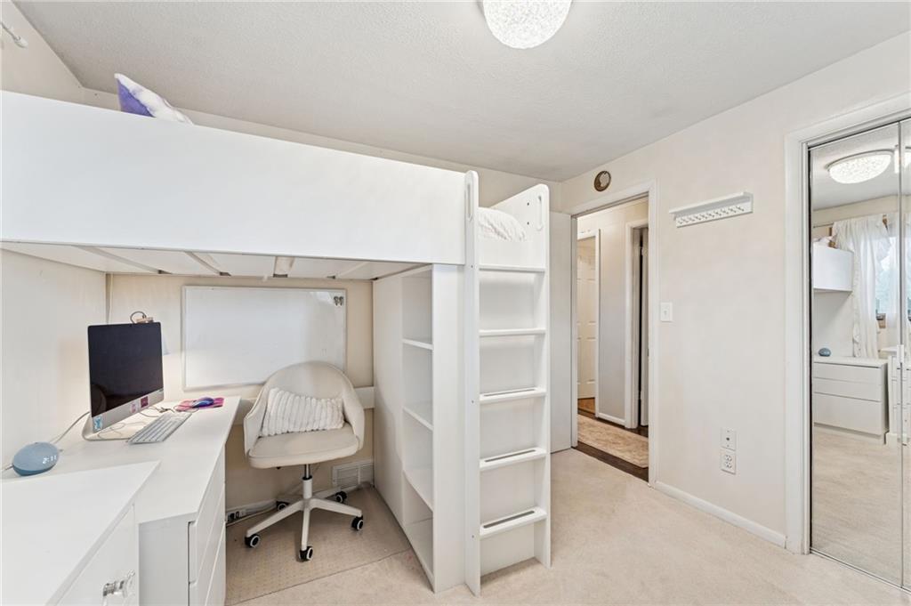 367 Brewer Road Rochester, PA 15074 - Photo 20 of 31 a view of a bedroom with a workspace
