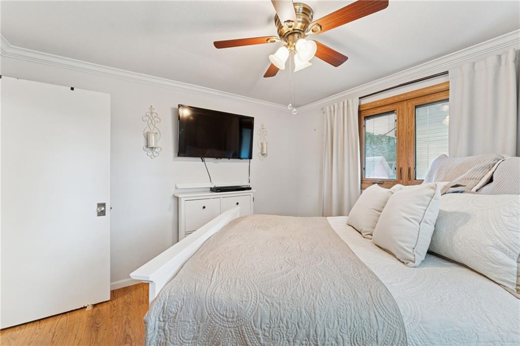 367 Brewer Road Rochester, PA 15074 - Photo 22 of 31 a bedroom with a bed and a flat screen tv