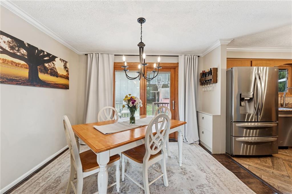 367 Brewer Road Rochester, PA 15074 - Photo 9 of 31 a dining room with furniture and window