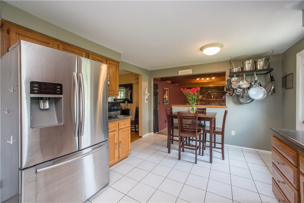 1304 Rolling Meadow Road Pittsburgh, PA 15241 - Photo 6 of 25 Open flow from kitchen to dining and living room