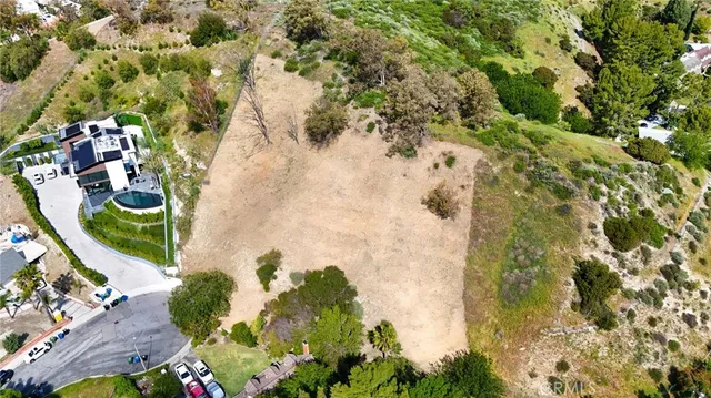 a view of swimming pool with a garden