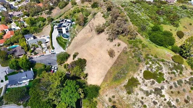 an aerial view of a multi story residential apartment building