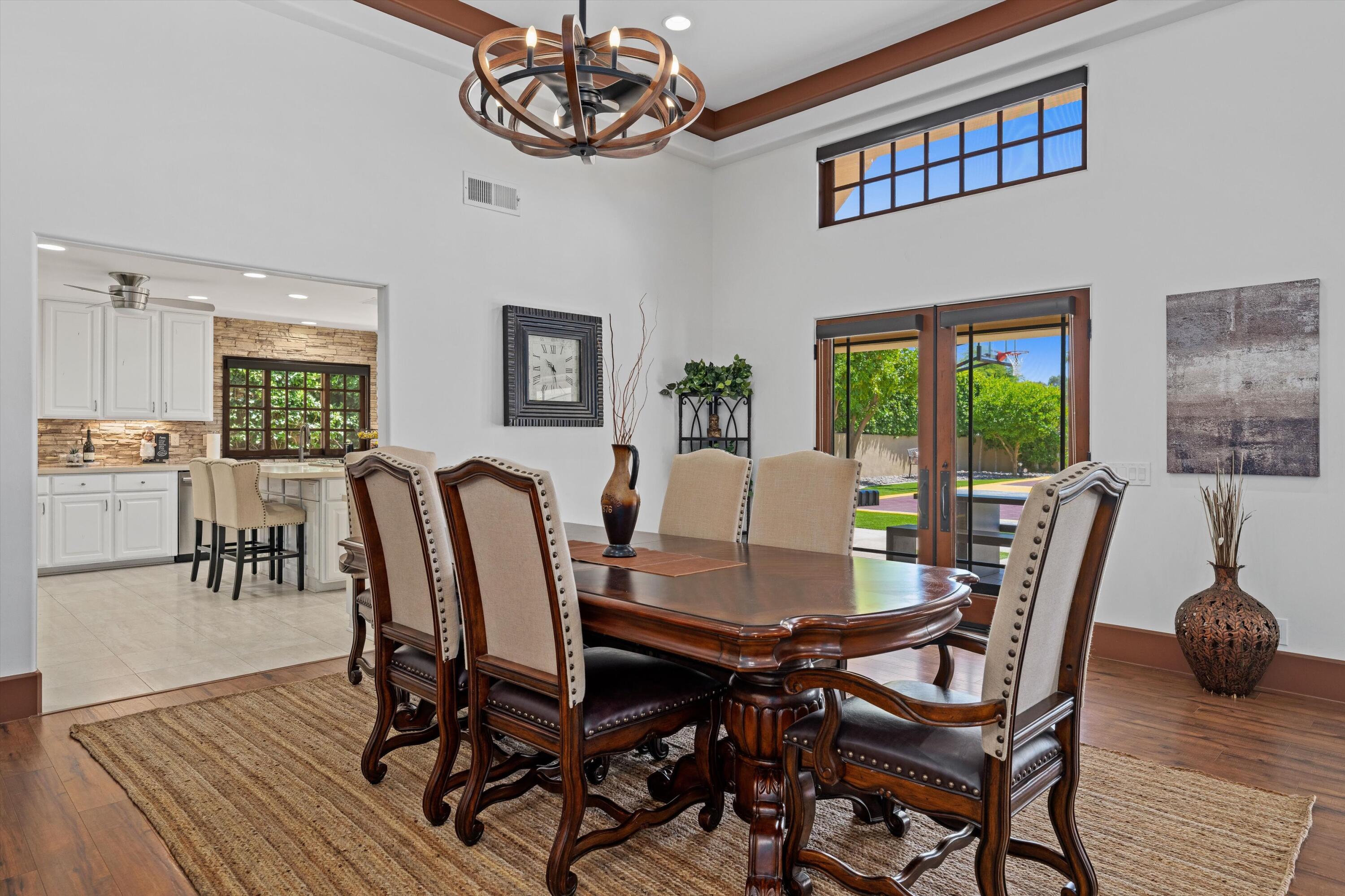 43190 Moore Circle Bermuda Dunes, CA 92203 - Photo 20 of 50 a view of a dining room with furniture a livingroom and chandelier