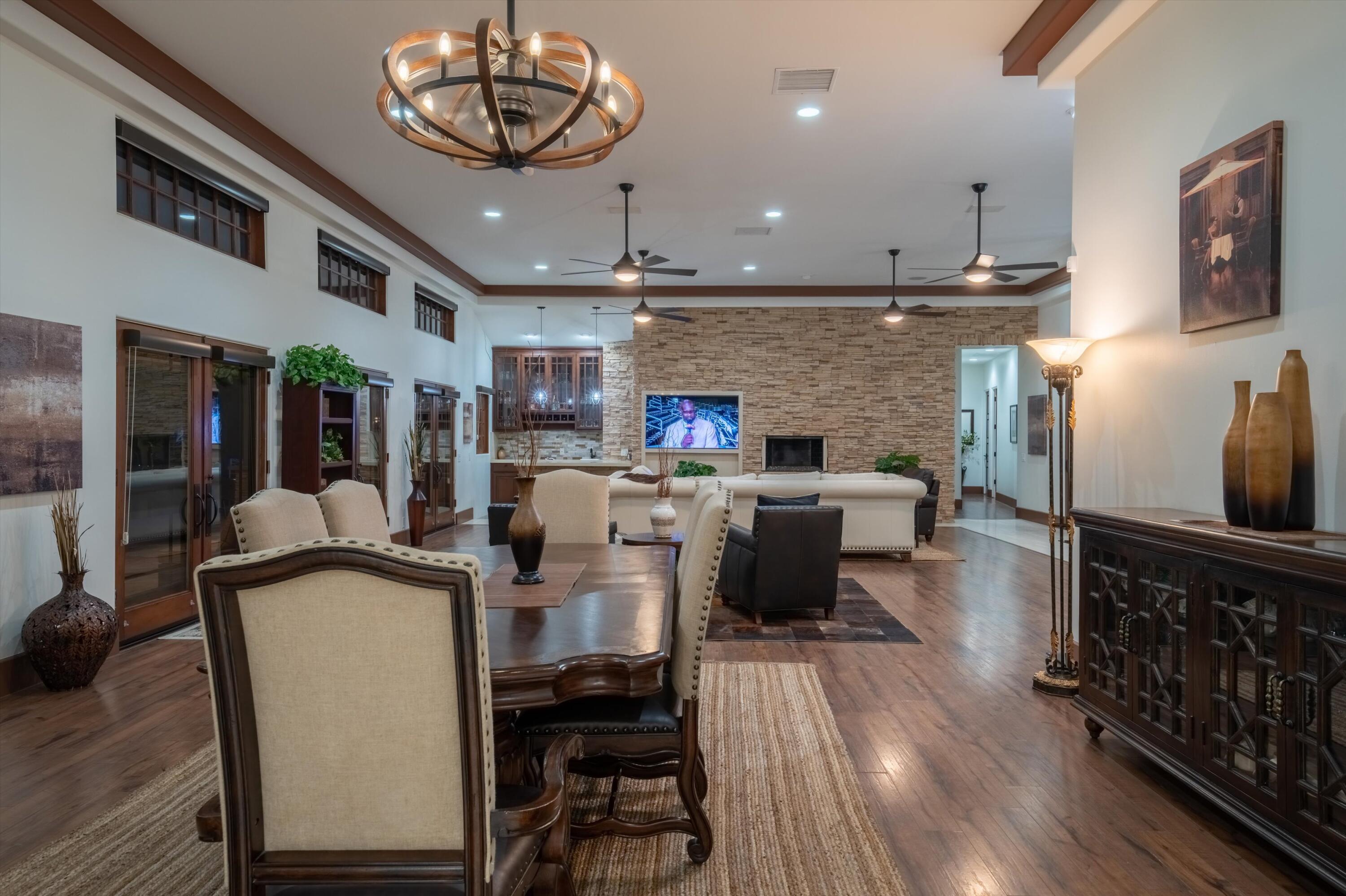43190 Moore Circle Bermuda Dunes, CA 92203 - Photo 22 of 50 a living room with furniture a fireplace and a flat screen tv