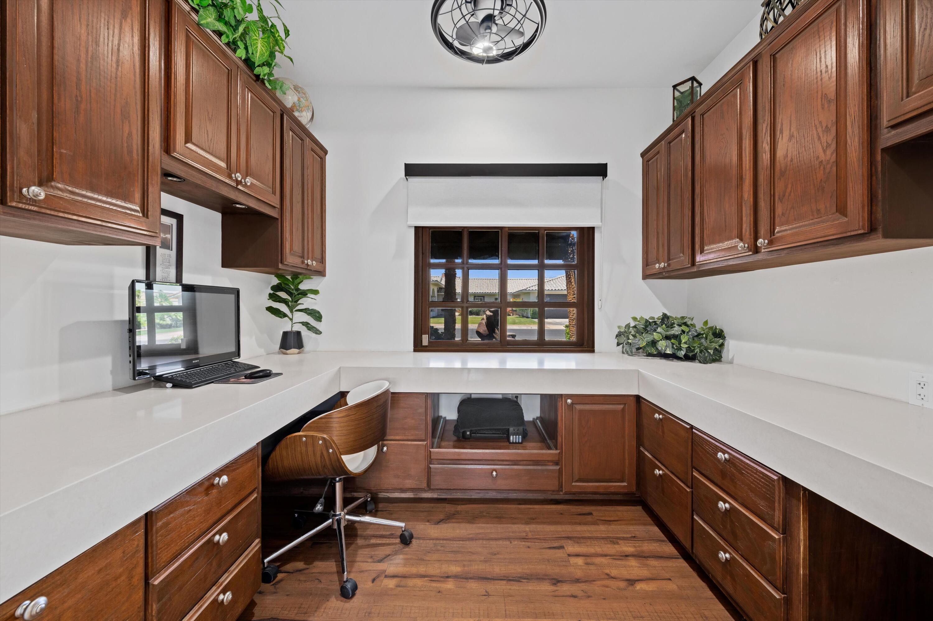 43190 Moore Circle Bermuda Dunes, CA 92203 - Photo 23 of 50 a kitchen with stainless steel appliances granite countertop a sink and cabinets