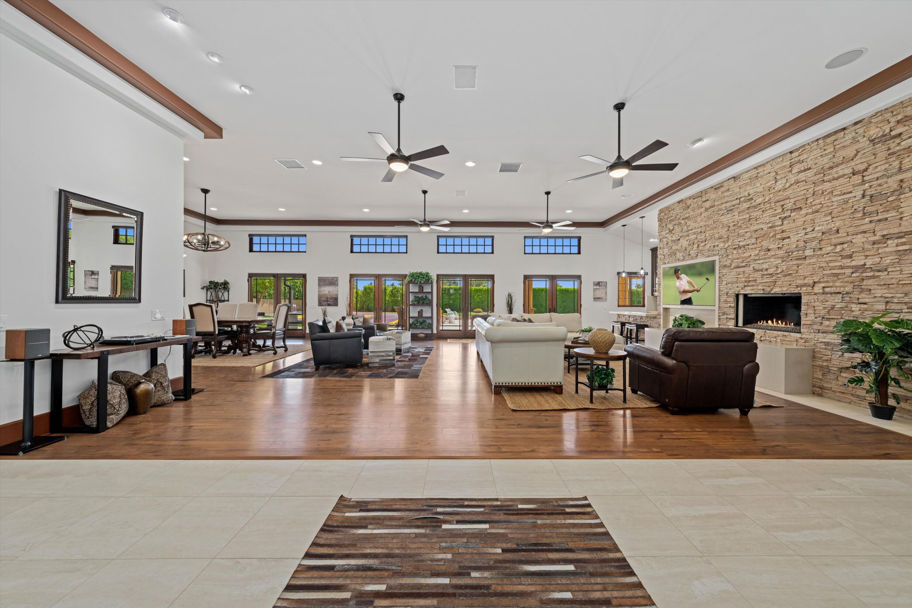 43190 Moore Circle Bermuda Dunes, CA 92203 - Photo 3 of 50 a living room with furniture and a fireplace